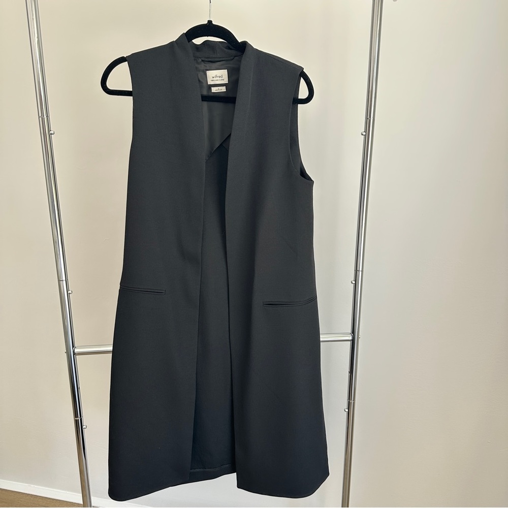 Sleeveless coat. Vest coat